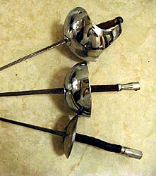 three classical fencing weapons